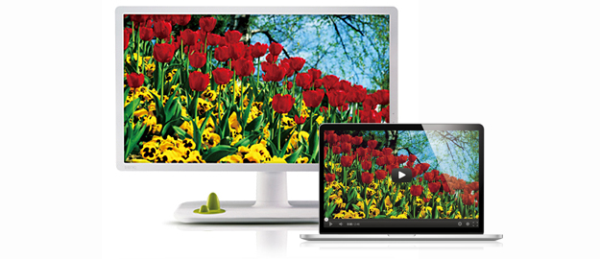 White monitor with macbook